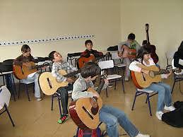 clases de canto y guitarra
