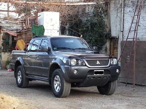 Mitsubishi L200 2006 recibo moto