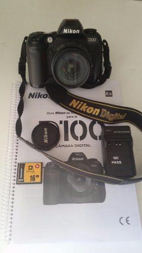 Nikon D100 + Nikkor 50mm 1,8d + Holga 60mm + Manual Y Bolso