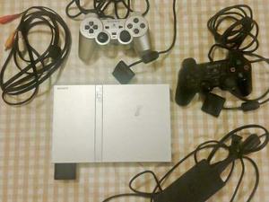 Playstation 2 + 2 Joysticks Originales + 1 Juego