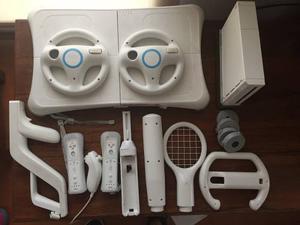 Wii + Wii Fit + Guitarra + 2 Controles + 9 Juegos Originales