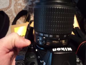 Lente zoom Nikon  impecable con filtros