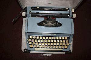 maquina de escribir con maletín rígido