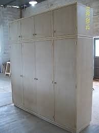 Vendo placard de madera 8 puertas y 4 cajones