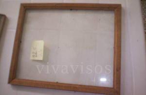 marco 22,5x26 con vidrio, madera virgen $100