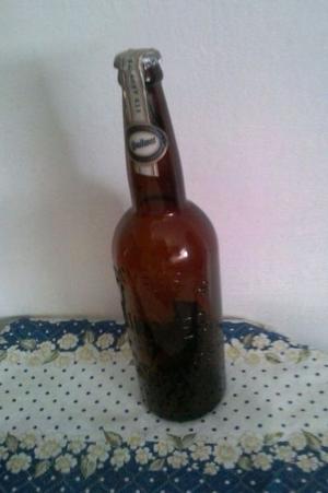 BOTELLA DE CERVEZA QUILMES 115 ANIVERSARIO LETRAS EN RELIEVE