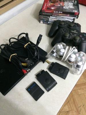 PlayStation 2 + 3 joysticks + memory card 64 MB + juegos