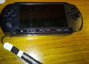 Psp E- + Cargador + Juegos.