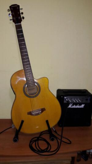Guitarra electroacustica marca Fernández y anplificador