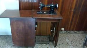 mueble con maquina de coser VENDO antigua