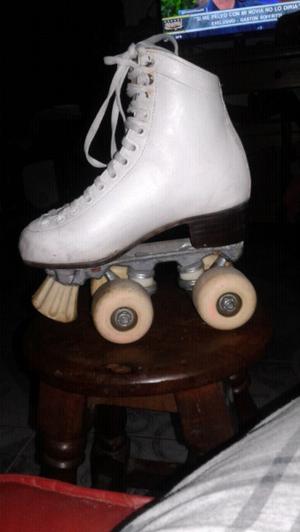 Patines profecionales poco uso talle 37 con bolso de regalo.