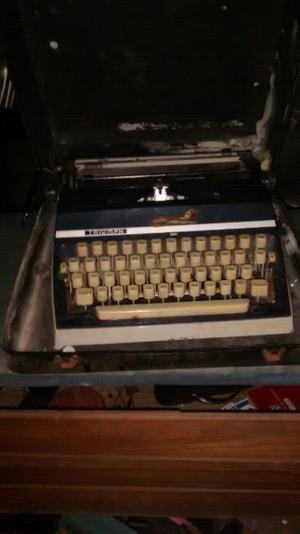 Maquina de escribir marca triump