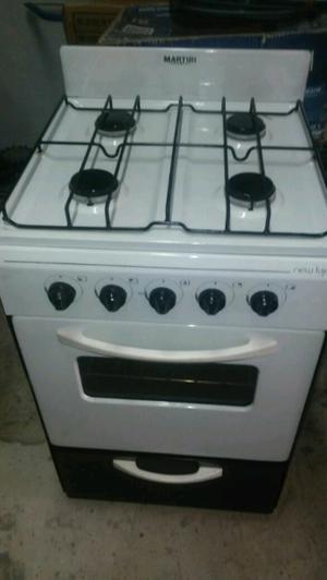 VENDO: COCINA MARTIRI USADA 4 HORNALLAS Y HORNO FUNCIONANDO