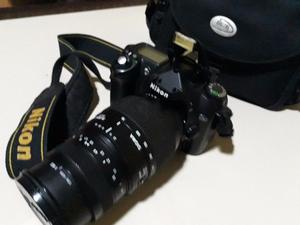 Camara Nikon D50 con Lente Sigma.