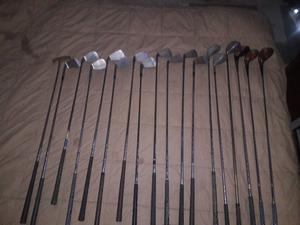 18 palos de golf, 2 bolsas, 28 pelotas, 4 fundas de palos, y