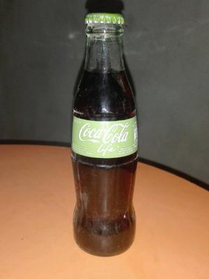Primera botella de coca cola life colección
