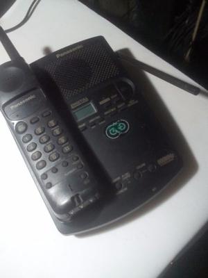 1 telefono antiguo con atendedor