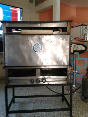 Vendo horno con plancha tres bandejas escucho ofertas