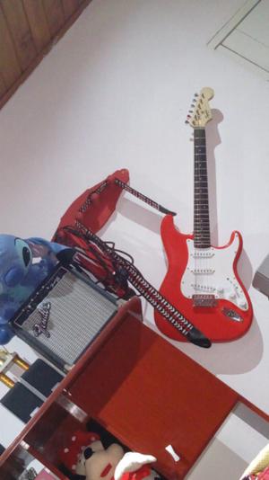 Guitarra eléctrica y amplificador Fender