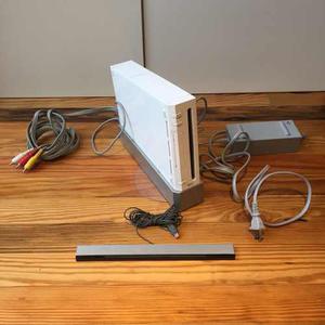 Nintendo Wii + 4 Joystick + 4 Nunchuck + 8 Juegos