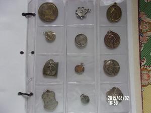 medallas y monedas antiguas c/u$250.-