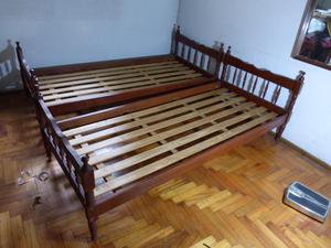 Dos camas de madera de una plaza