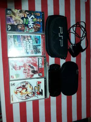 Psp  con 4 juegos originales y dos fundas