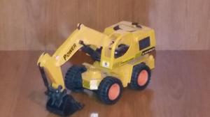 tractor amarilo con pala manual