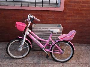 Bicicleta de nena color rosa y blanca