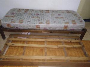 Cama con colchón y carro