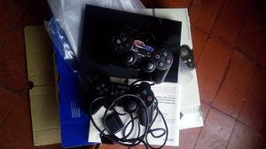 PlayStation 2 con 20 juegos impecable estado...