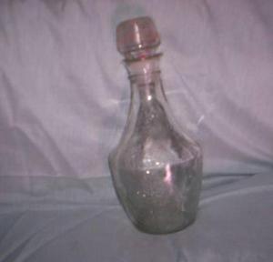 botellon con tapon en vidrio alto 28cm diametro 13cm