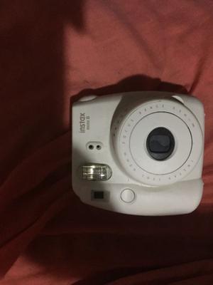 Vendo cámara instantánea Mini8