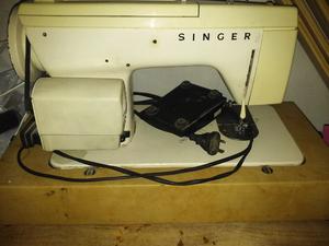 Vendo máquina de coser singer portátil