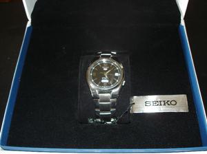 Reloj Seiko snk623k1- SwatchYSG438G leer