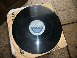 disco de pasta Carlos Gardel "guitarra mía" y "caminito
