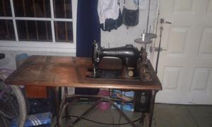 Máquina de coser o permuto