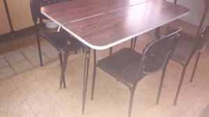 mesa de formica y 4 sillaa