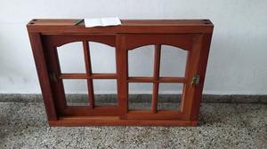 Ventana de madera con vidrios colocados y burletes