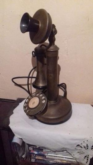 Telefono de candelero original funcionando en bronce