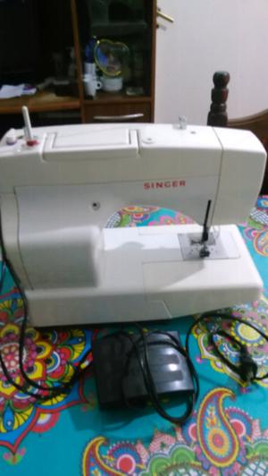 Maquina de coser singer florencia 69