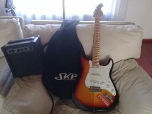 Guitarra electrica skp con amplificador