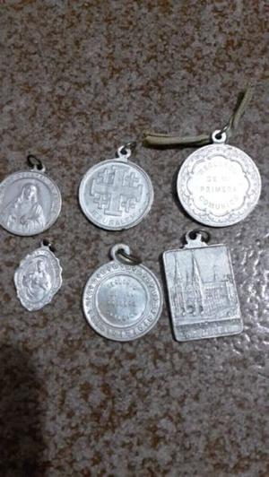 Medallas de aluminio antiguas santos