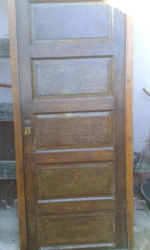 Vendo puerta de madera con marco