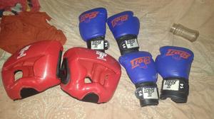 Dos pares de guantes y cabezales de box marca trops