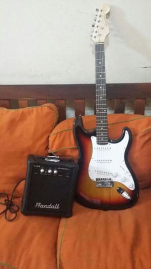 Guitarra electrica + amplificador y accesorios