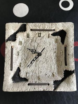 Reloj de pared de cemento