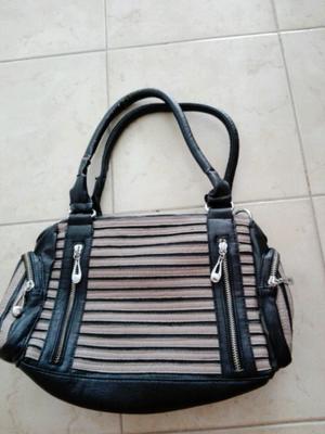 Cartera de cuero negro y rosa viejo un uso