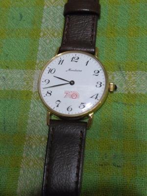 reloj mondaine a cuerda