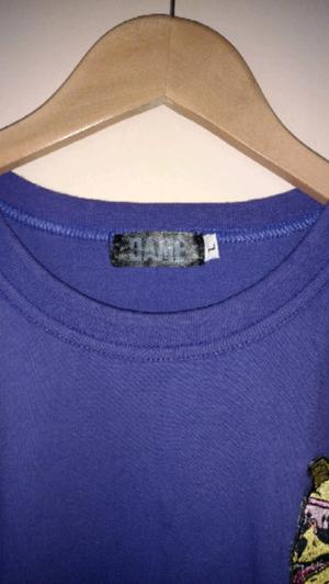 Remera DAME violeta c/aplique TALLE L